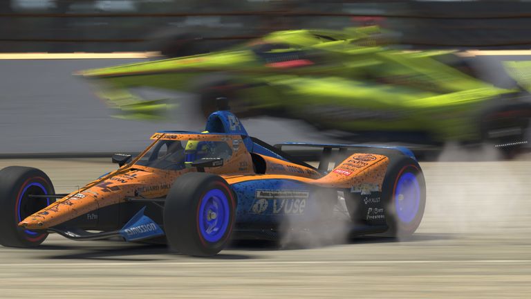 Watch the moment that caused big controversy in IndyCar's iRacing Challenge at virtual Indianapolis as Simon Pagenaud collided with race leader Lando Norris.