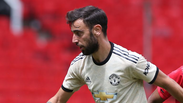 Bruno Fernandes carries the ball during a Manchester United first-team training session at Old Trafford