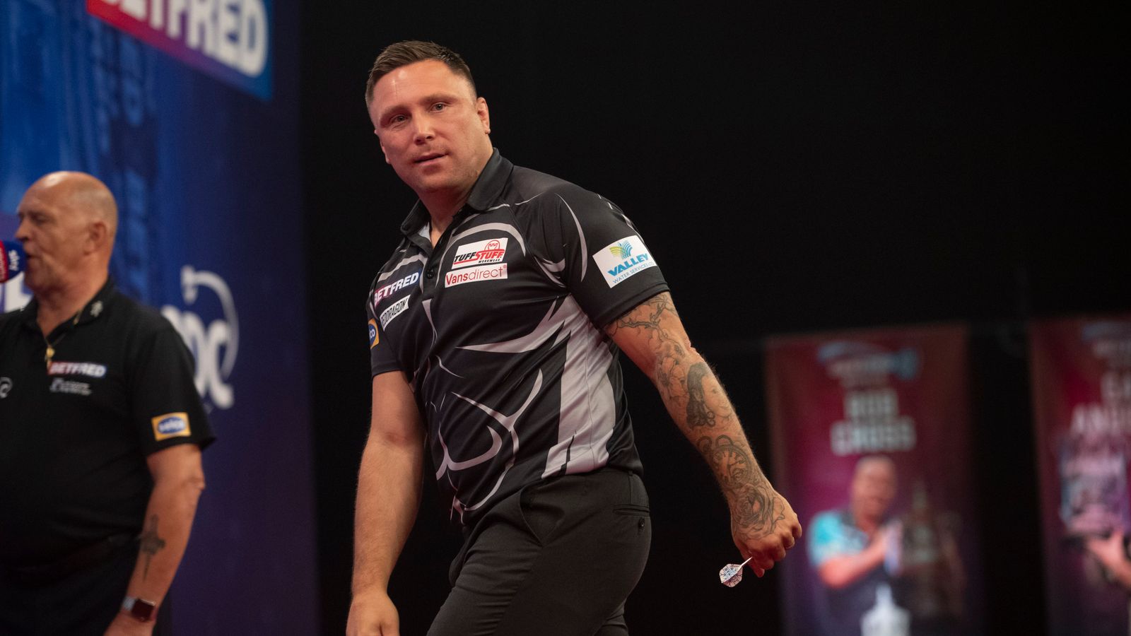 World Matchplay Gerwyn Price beaten as Daryl Gurney marches on in