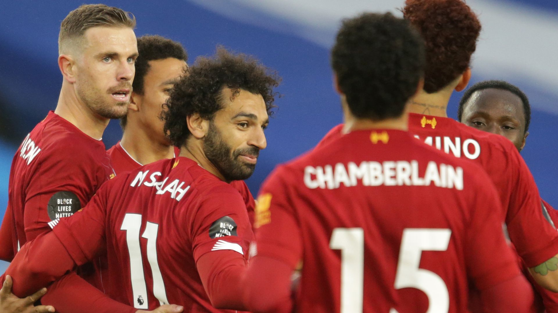 Salah double helps beat plucky Brighton