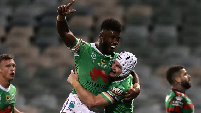 Try-scorers Semi Valemei and Jarrod Croker celebrate during Canberra's win over Souths