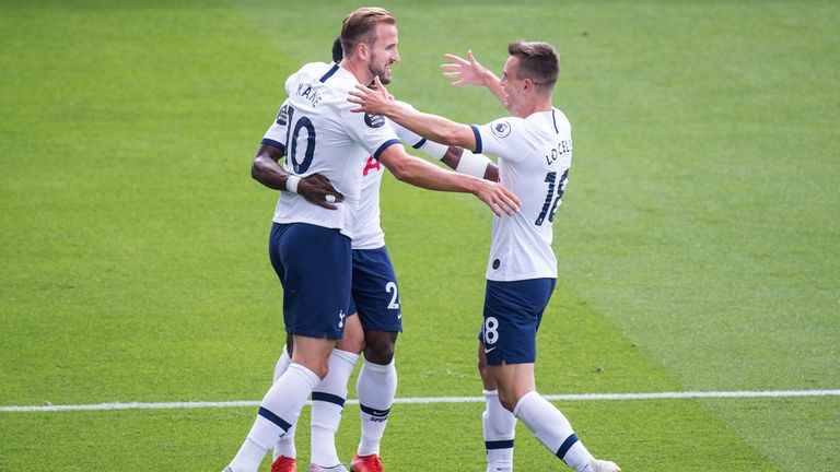 Harry Kane celebrate with teammates Giovani Lo Celso and Harry Winks after scoring against Crystal Palace
