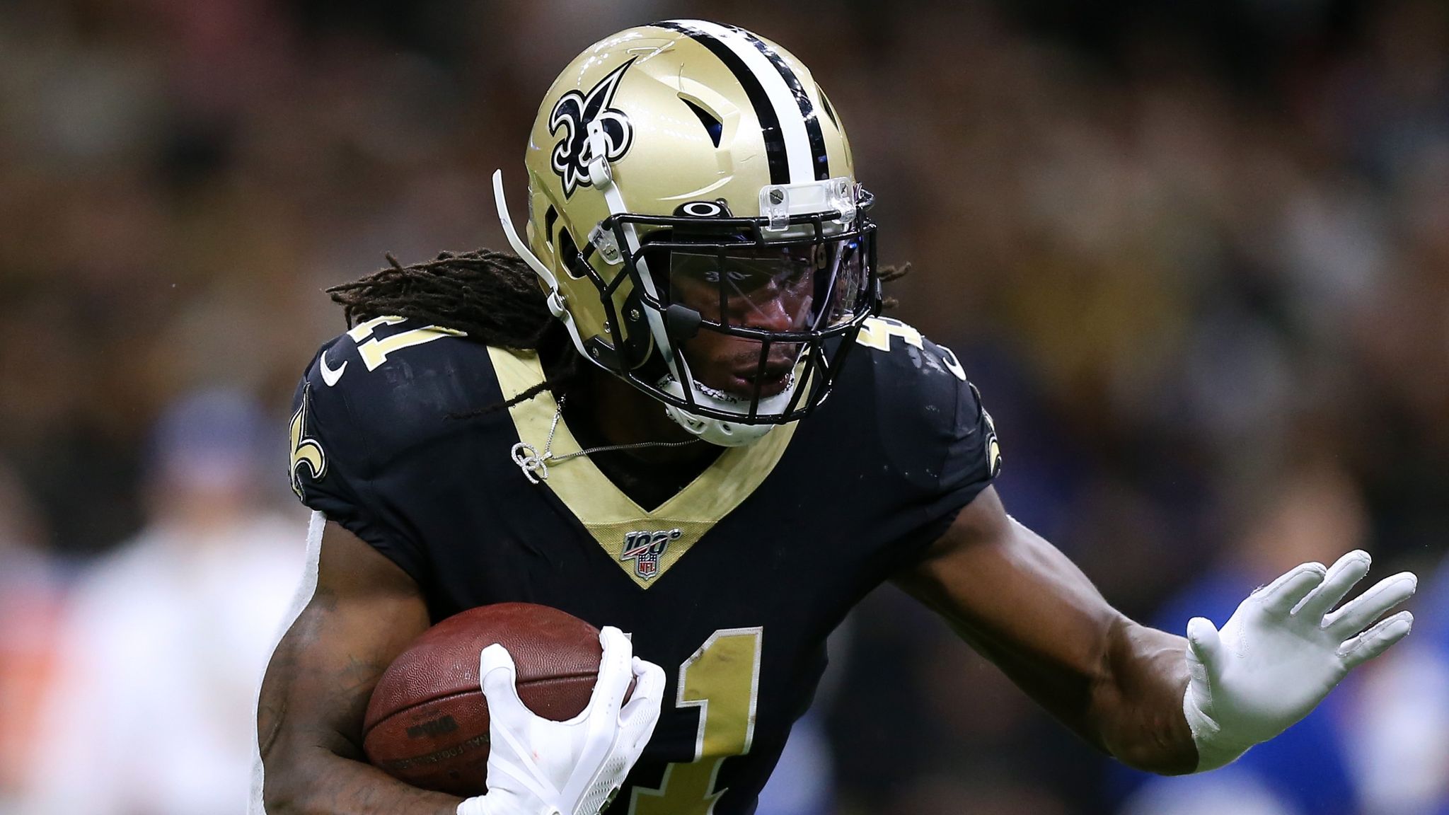 FILE - In this Oct. 6, 2019. file photo, New Orleans Saints running back  Alvin Kamara (41) carries next to Tampa Bay Buccaneers cornerback M.J.  Stewart (36) during the second half of