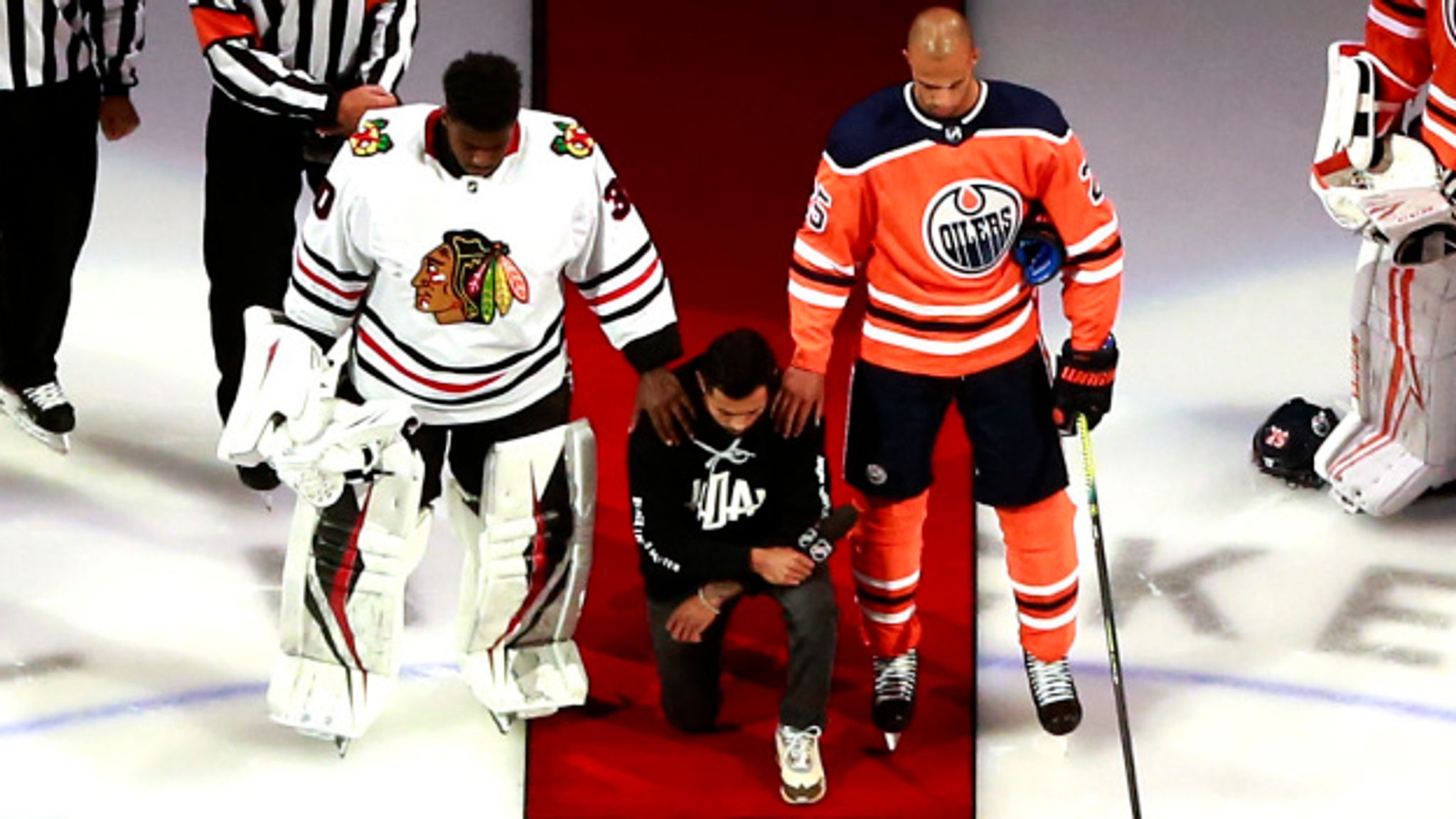 Matt Dumba kneels, NHL puts focus on 