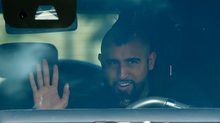 Midfielder Arturo Vidal greets his arrival for the tests