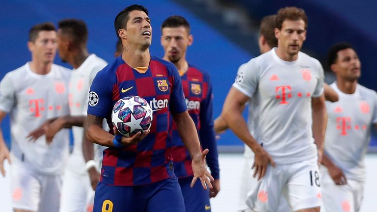 Luis Suarez reacts after another Bayern Munich goal