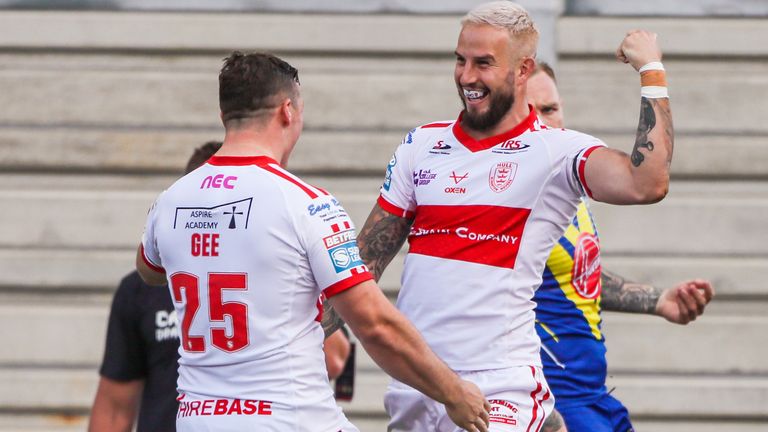 Hull KR's Ben Crooks celebrates his try with Matthew Gee