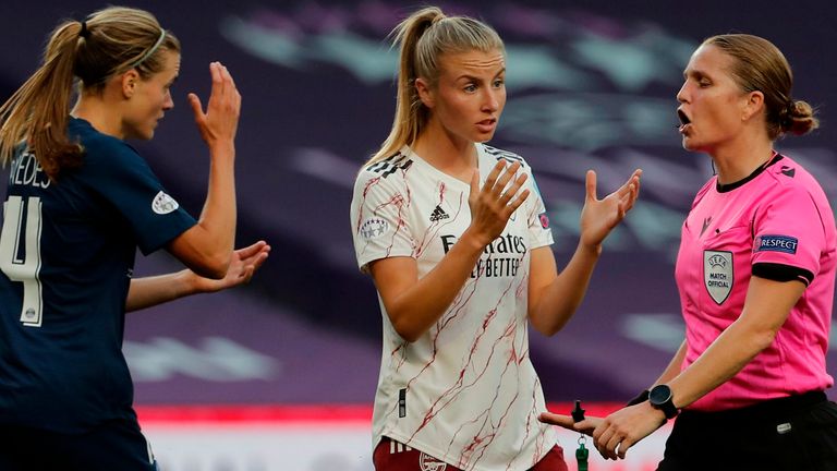 Leah Williamson contests a decision during the Champions League quarter-final defeat to PSG