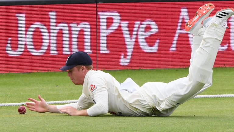 Pope, seen here fielding on the third day of the third test, injured his shoulder while diving for the ball on the fourth day of the same test.