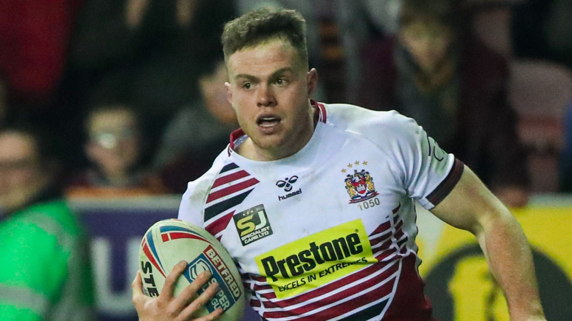 Burgess double gives Wigan win in front of fans