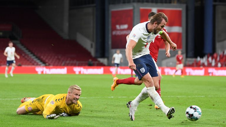 A distraught Kane watches his injury time shot clear the line