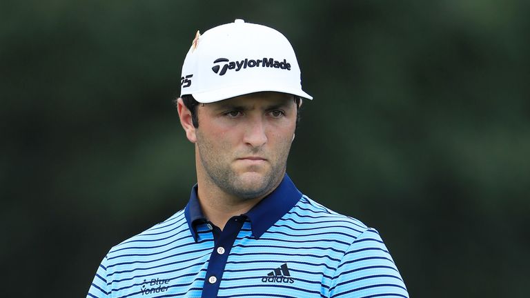 Jon Rahm pulled level with Dustin Johnson after a 65