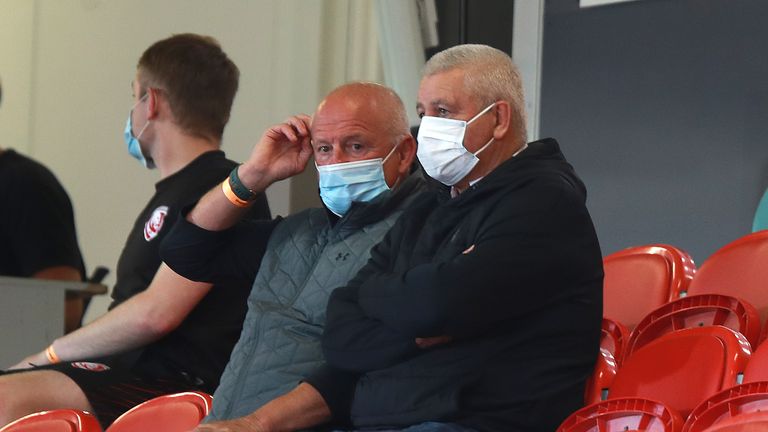 Warren Gatland (R) looks on with Lions logistics manager Alan Phillips
