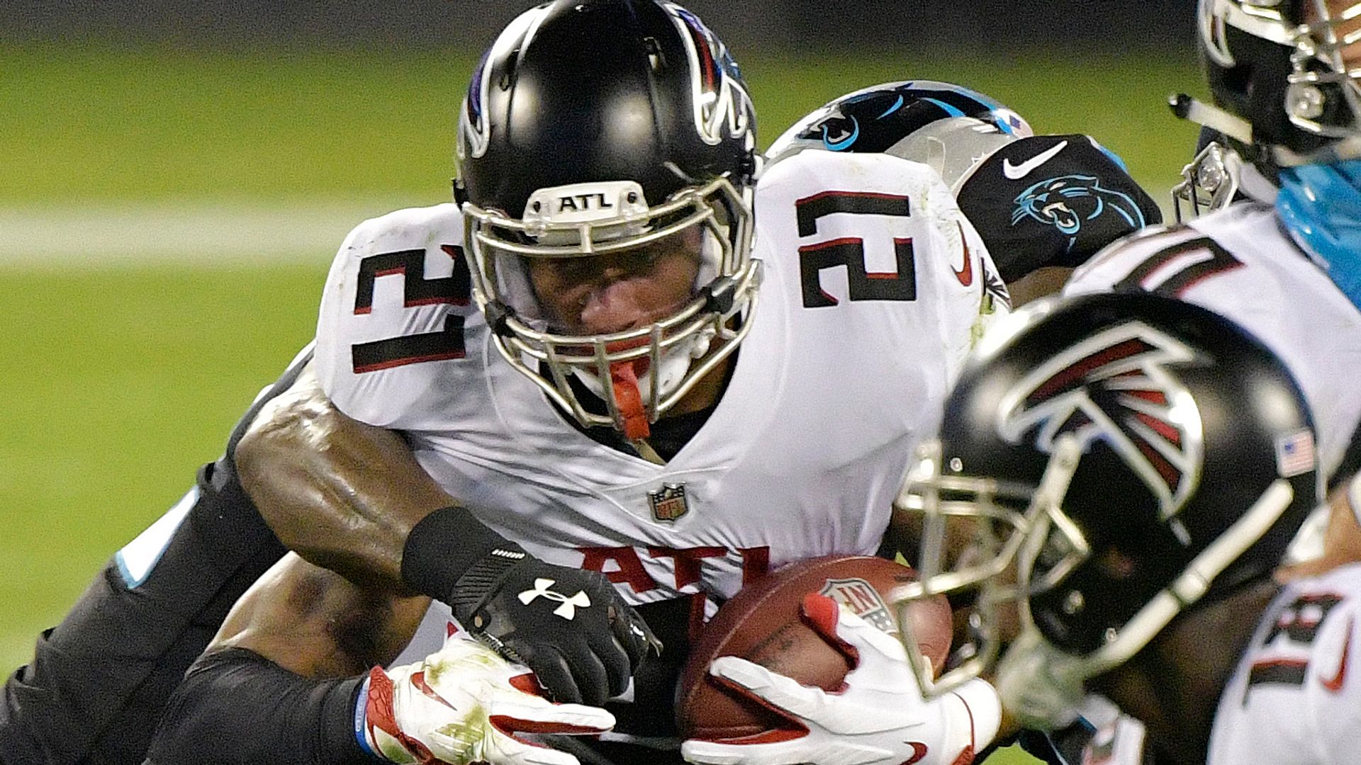 Falcons cling on to lead in Carolina road win
