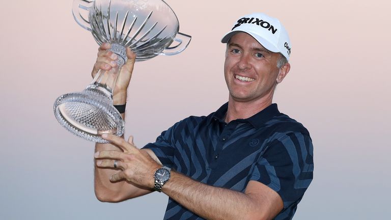 Martin Laird proudly holds aloft the trophy after winning the Shriners Hospitals for Children Open at TPC Summerlin
