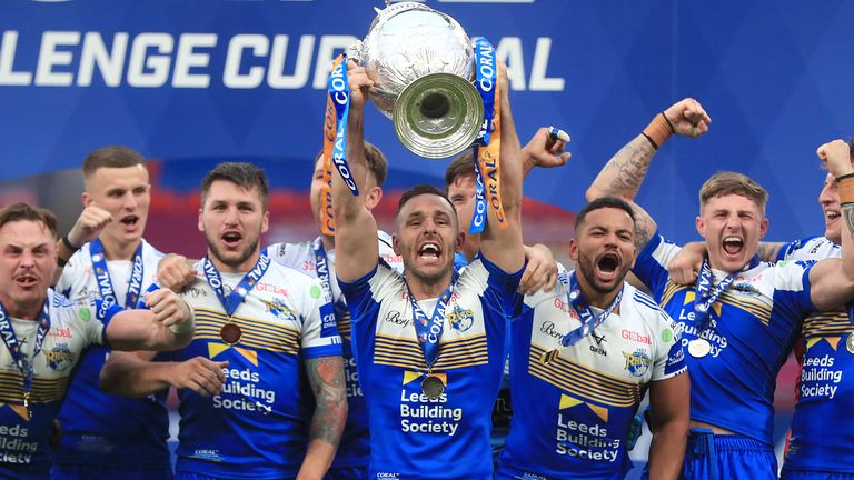 Luke Gale lifts the trophy as Leeds celebrate their Challenge Cup triumph