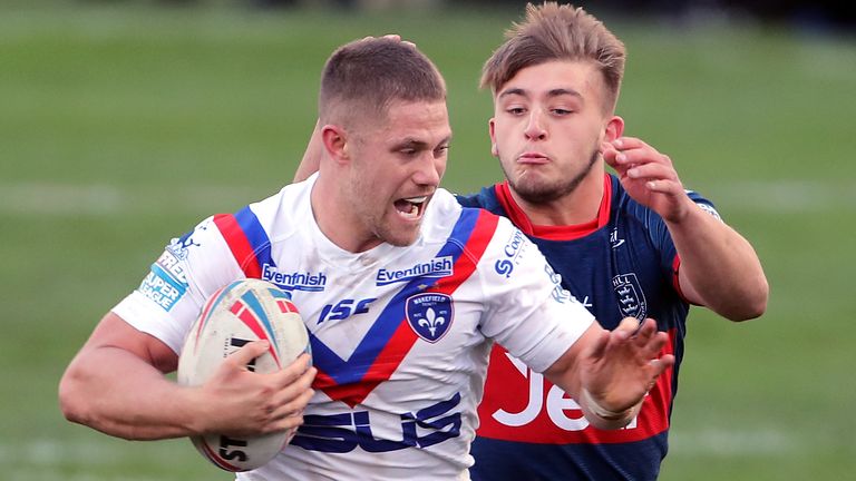 Ryan Hampshire on the charge for Wakefield against Hull KR