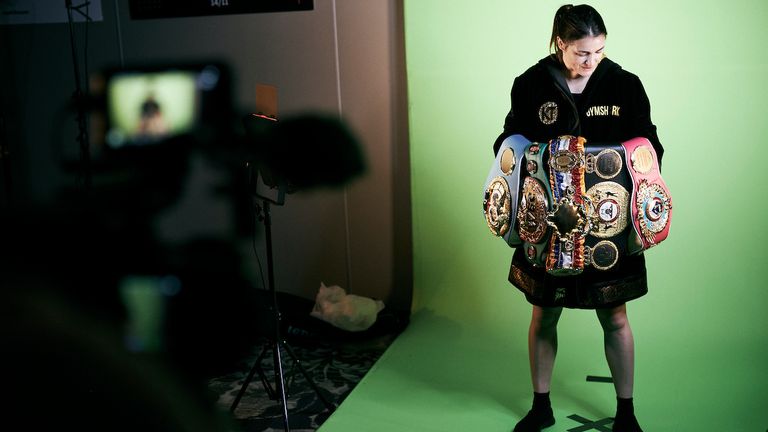 Katie Taylor holds all major light belts