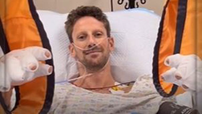 Romain Grosjean posted a video from his hospital bed telling fans 'I'm sort of ok' following his horrific crash in Sunday's Bahrain Grand Prix.