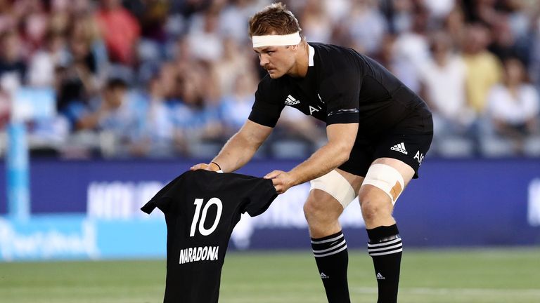 All Blacks skipper Sam Cane lays down a number 10 jersey in memory of Diego Maradona
