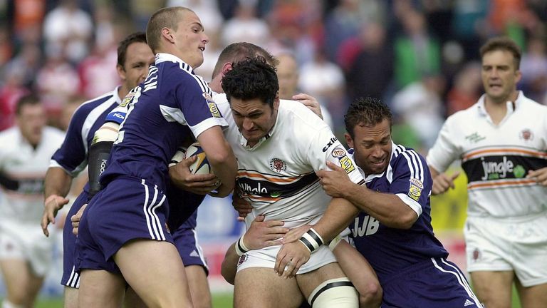 Sean O'Loughlin and Adrian Lam tackle Castleford's Michael Smith in 2002