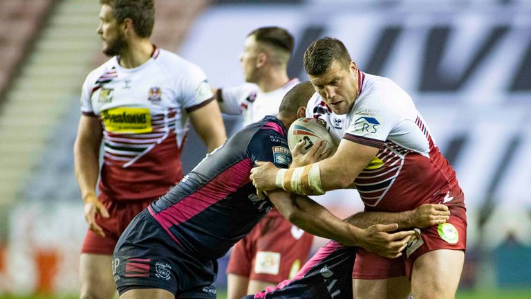 Wigan Warriors convincingly beat Hull FC 29-2 to book their place in the Super League Grand Final