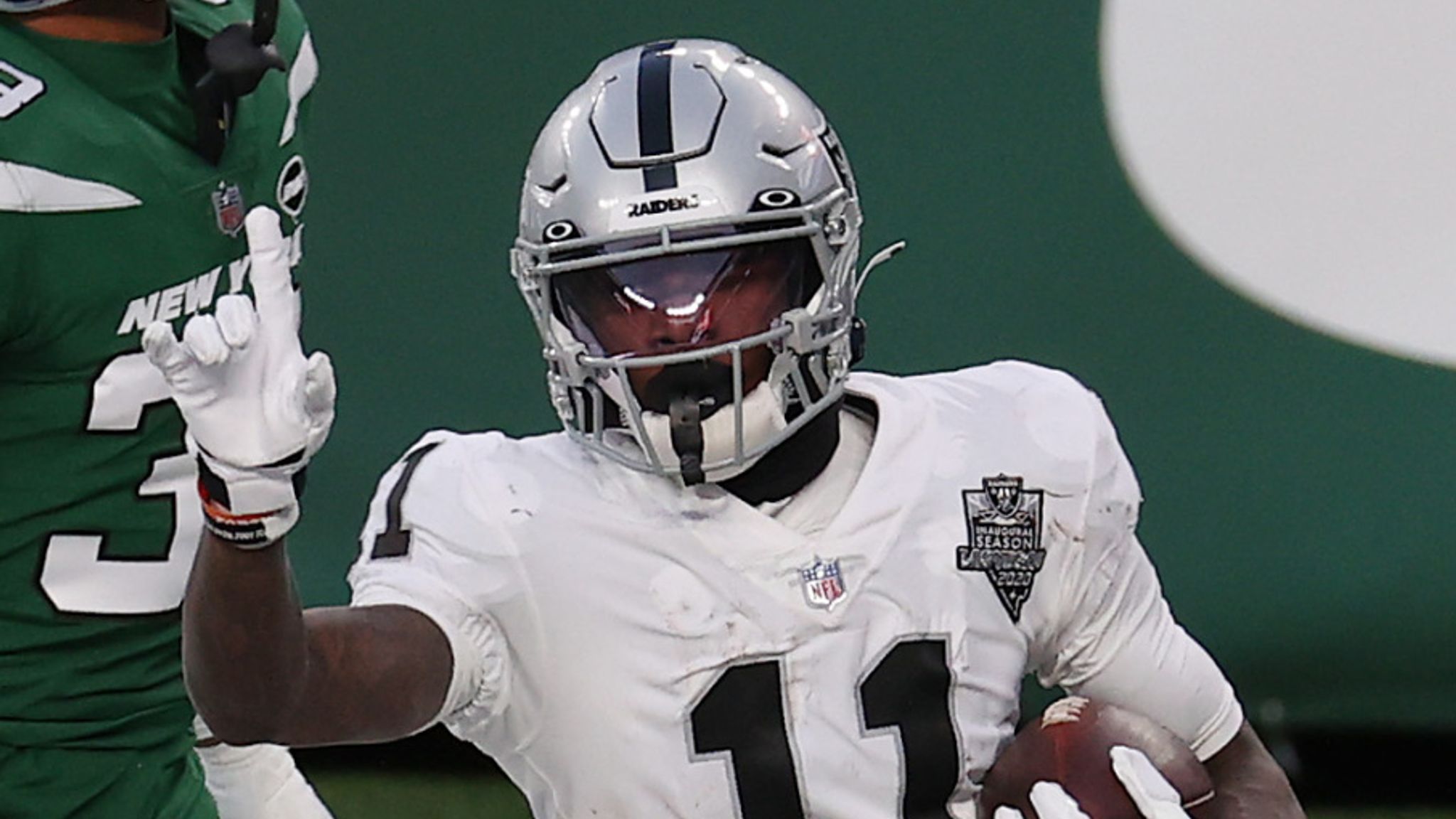 East Rutherford, New Jersey, USA. 6th Dec, 2020. Las Vegas Raiders wide  receiver Henry Ruggs III (11) in action against New York Jets free safety  Marcus Maye (20) during the NFL game