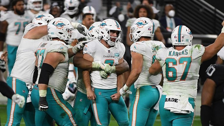 Dolphins beat Ravens in OT for first win, 22-16