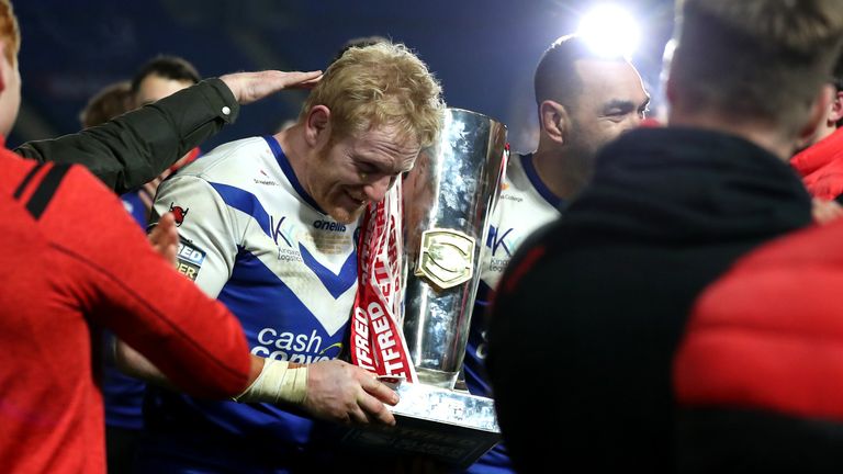 James Graham celebrates with the trophy after St Helens' Grand Final triumph