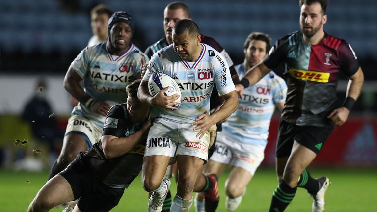 Kurtley Beale tests the Harlequins defence