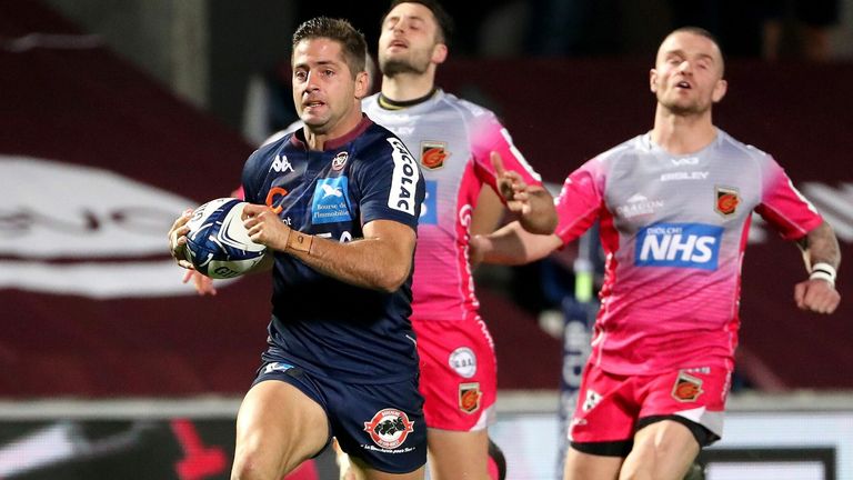 Bordeaux' Argentinian wing Santiago Cordero runs to score one of his three tries