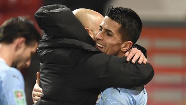 Pep Guardiola embraces Joao Cancelo