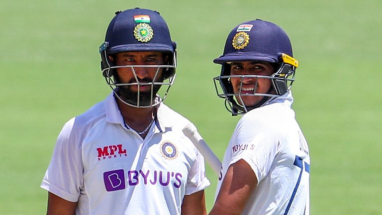 Pujara (left) was out for a duck when India were razed in Adelaide in December