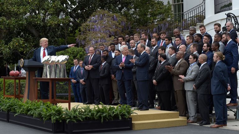 Trump during a ceremony at the White House in April 2017 as the President honoured the New England Patriots for their Super Bowl victory 