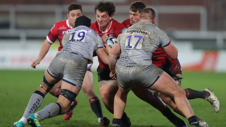 Val Rapava-Ruskin runs into Josh Beaumont (left) and Valery Morozov