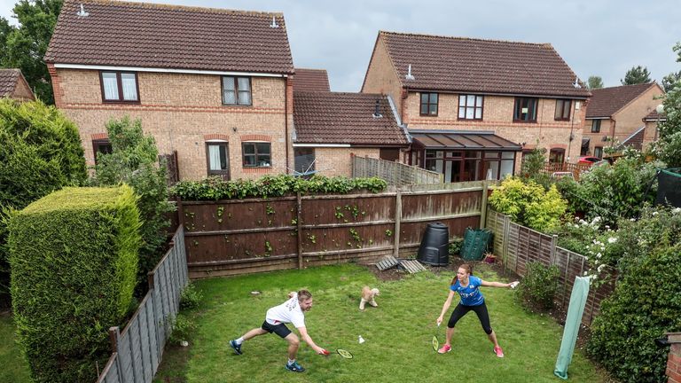 British badminton players Lauren Smith and Marcus Ellis improvise to keep up their fitness in the back garden of their Milton Keynes home (Pic: PA)