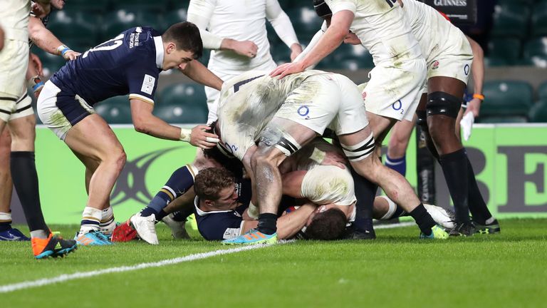 Van der Merwe forces the ball onto the line to score Scotland's crucial try