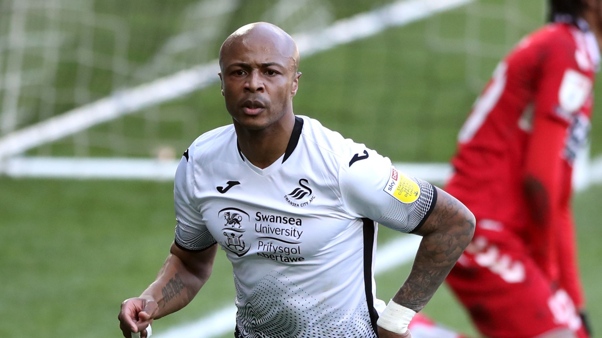 Ayew's last-gasp penalty seals win for Swans