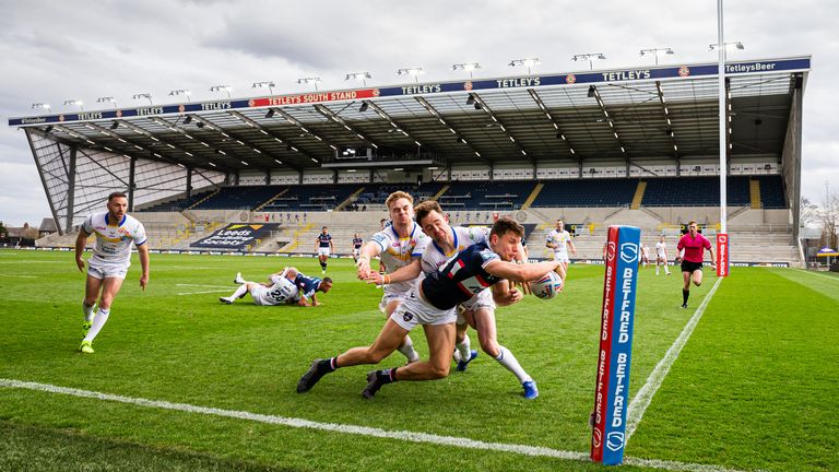 Wakefield's Innes Senior dives to score a try.