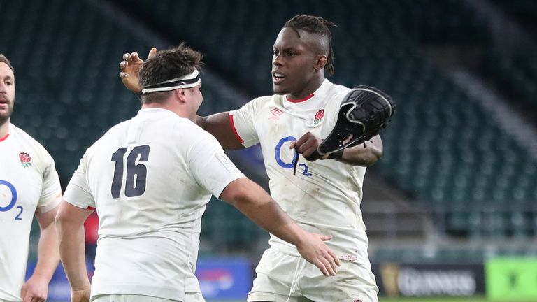 Itoje (R) and Jamie George celebrate England's win over France