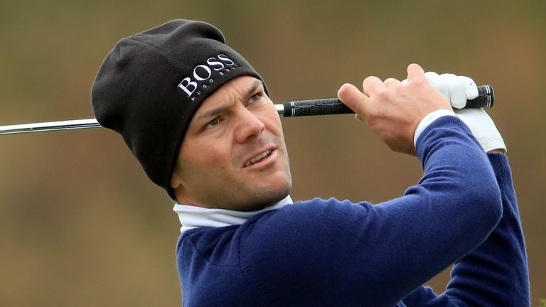 Martin Kaymer fired a 70 to stay one behind the Spaniard