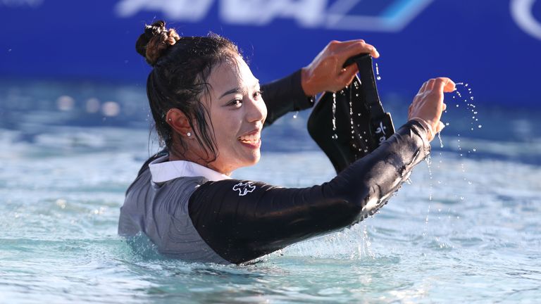 Patty Tavatanakit celebrated her ANA Inspiration victory with the traditional jump in Poppie's Pond before receiving the trophy in Mission Hills.
