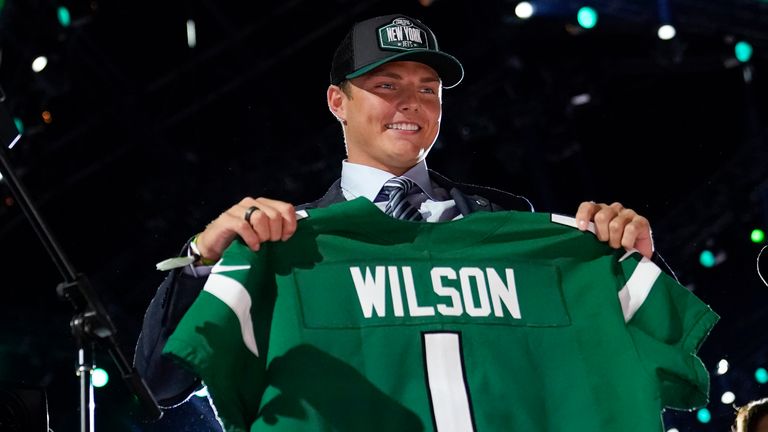 Zach Wilson gets used to his new colours after being selected by the New York Jets (AP Photo/Tony Dejak)