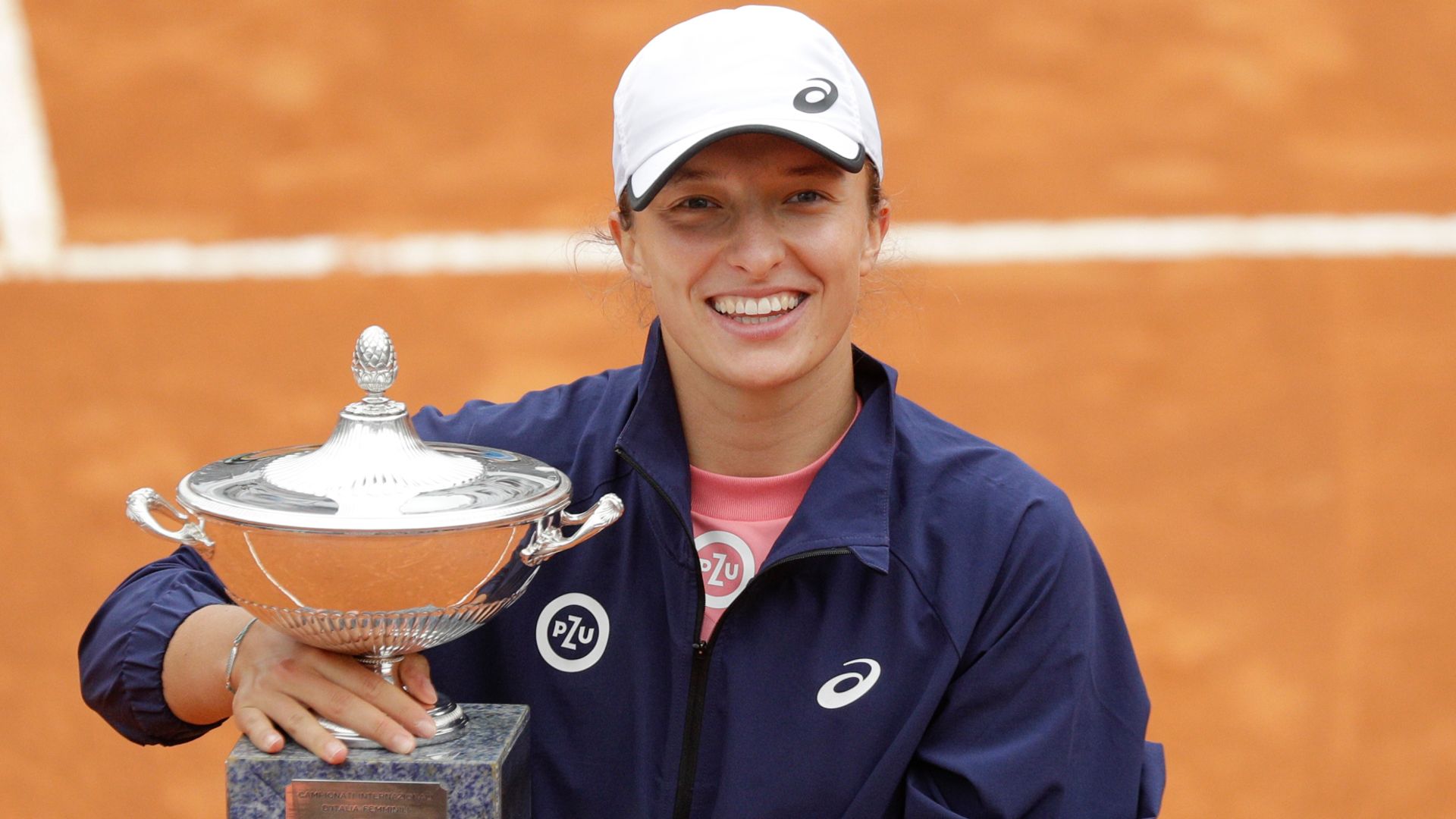 Swiatek double bagels Pliskova to win Rome title