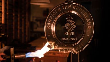 Ajax melted down the Eredivisie trophy to create mementos for their supporters