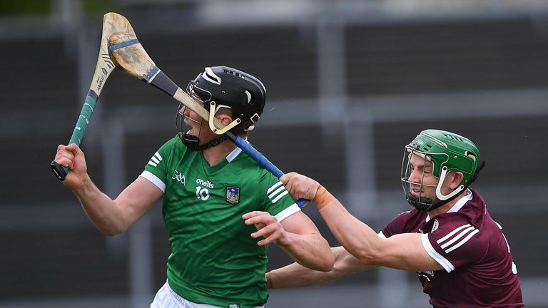 Adrian Tuohey of Galway tackles Gearoid Hegarty of Limerick