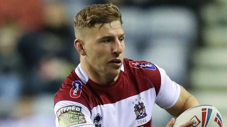 Williams spent seven years playing with hometown club Wigan 