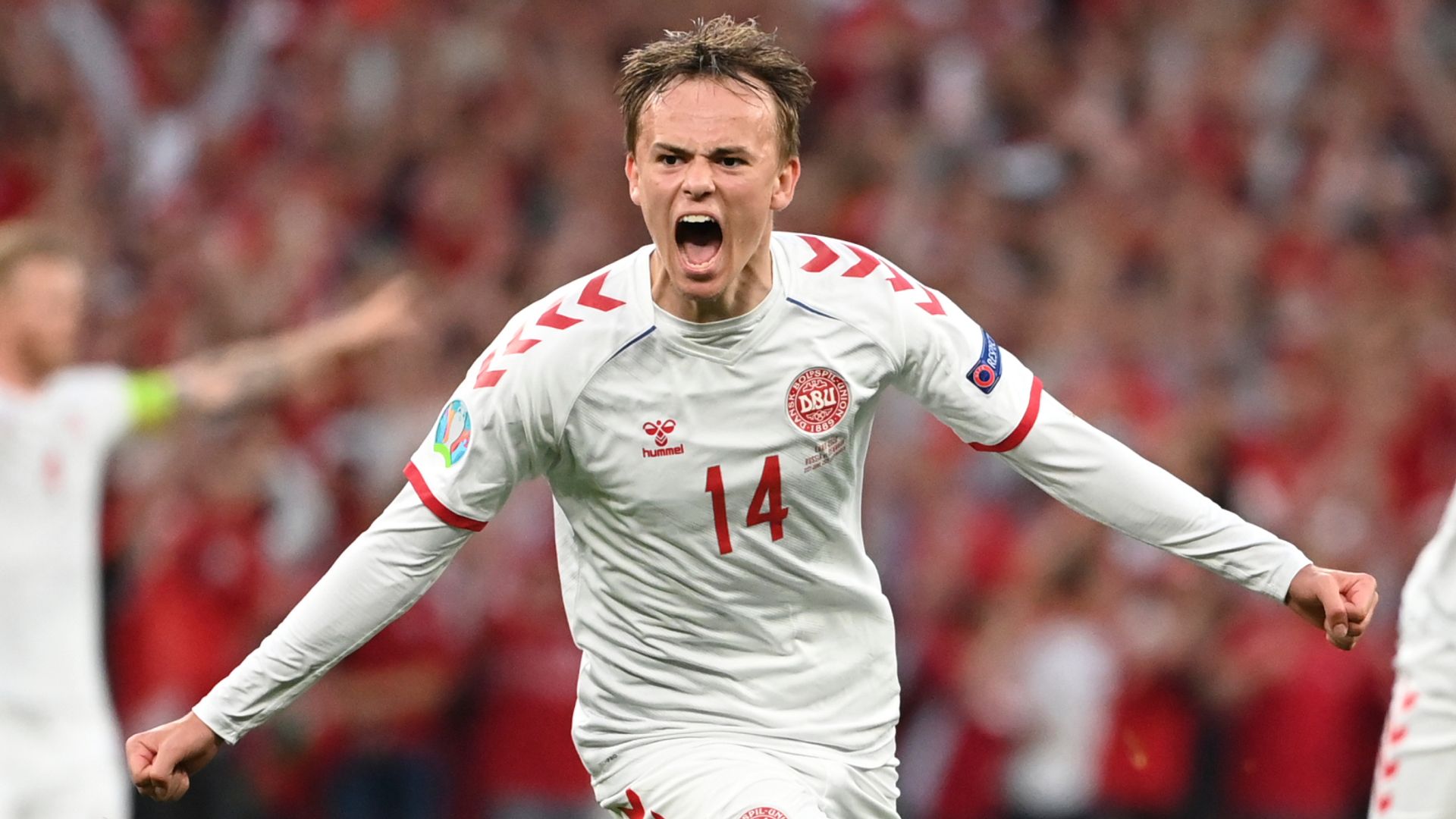 Emotional Denmark thrash Russia to face Wales in last 16