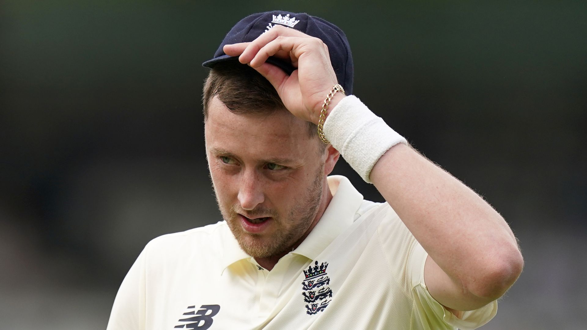 Robinson 'embarrassed' by racist, sexist tweets