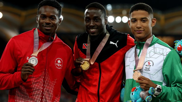 Reid (right) won bronze for Northern Ireland in the 200m at the 2018 Commonwealth Games